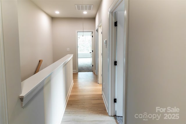 615 Billingsley Rd, Charlotte, NC 28211 - hallway featuring recessed lighting, an upstairs landing, visible vents, and light wood-style flooring