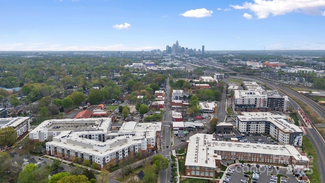 birds eye view of property with a view of city