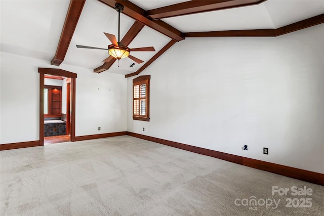 unfurnished room featuring visible vents, baseboards, ceiling fan, vaulted ceiling with beams, and light carpet