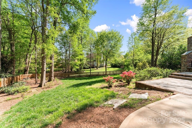 view of yard with fence
