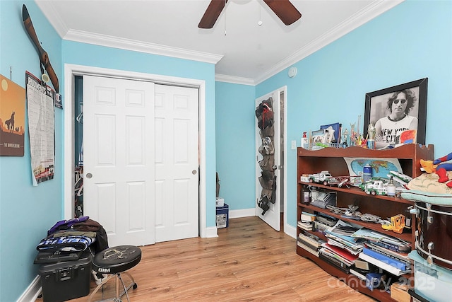 8301 Washington Blvd, Charlotte, NC 28262 - interior space featuring light wood-style floors, ornamental molding, baseboards, and a ceiling fan