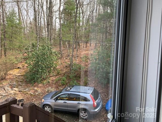 1474 Holiday Drive 14 & 15, Hendersonville, NC 28739 - view of parking / parking lot with a forest view