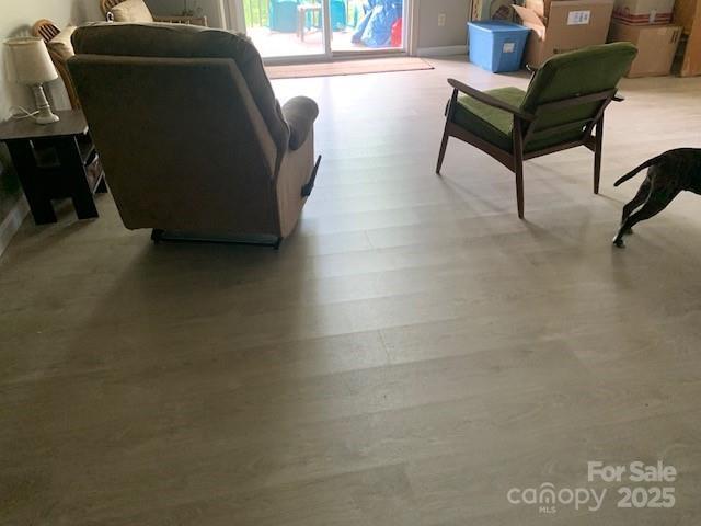 1474 Holiday Drive 14 & 15, Hendersonville, NC 28739 - living area featuring wood finished floors