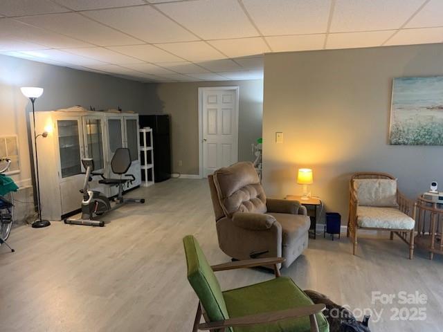 1474 Holiday Drive 14 & 15, Hendersonville, NC 28739 - sitting room with wood finished floors and a drop ceiling