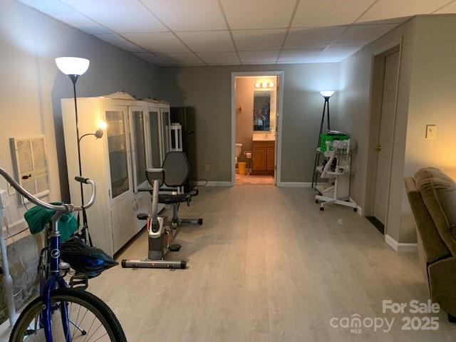 1474 Holiday Drive 14 & 15, Hendersonville, NC 28739 - exercise area with wood finished floors, baseboards, and a drop ceiling