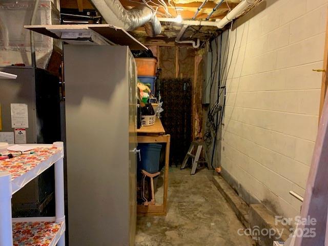 1474 Holiday Drive 14 & 15, Hendersonville, NC 28739 - unfinished below grade area featuring concrete block wall