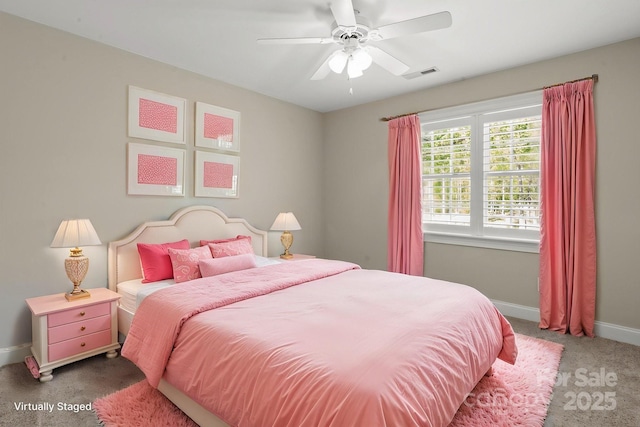 bedroom with carpet floors, visible vents, baseboards, and ceiling fan