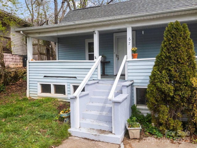 67 Montana Ave, Asheville, NC 28806 - doorway to property featuring a shingled roof and covered porch