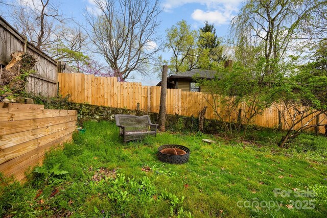 67 Montana Ave, Asheville, NC 28806 - view of yard with fence and a fire pit