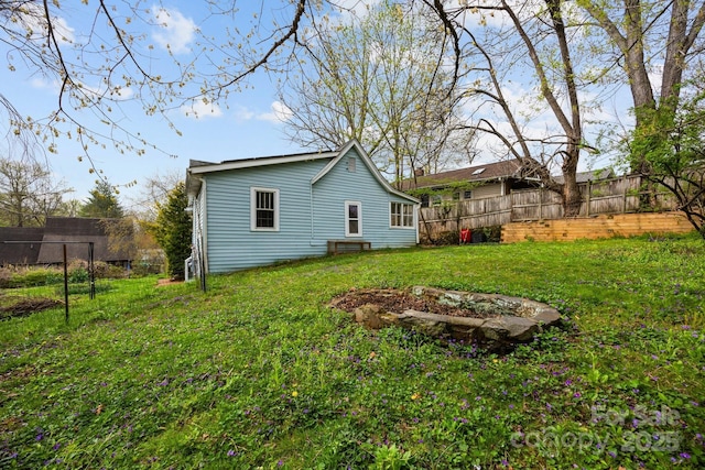 67 Montana Ave, Asheville, NC 28806 - rear view of house with fence and a lawn