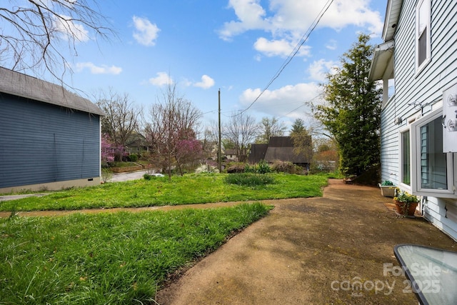 67 Montana Ave, Asheville, NC 28806 - view of yard featuring a patio