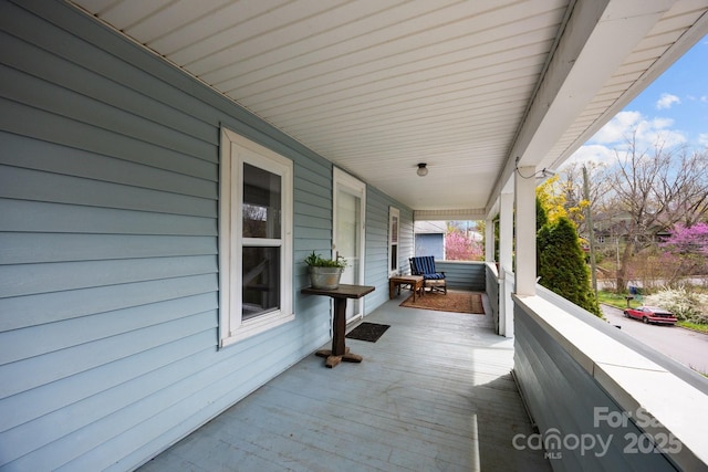 67 Montana Ave, Asheville, NC 28806 - wooden deck featuring a porch