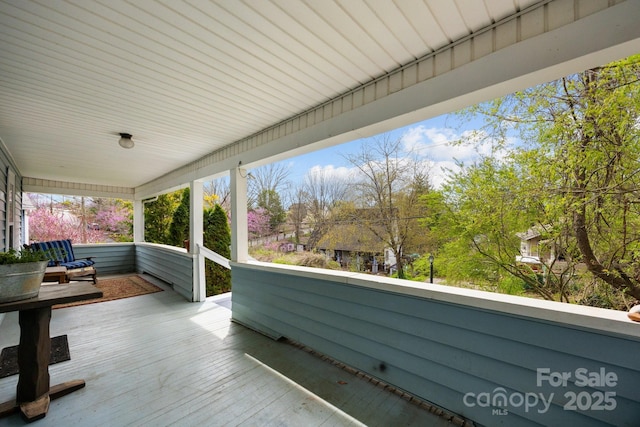 67 Montana Ave, Asheville, NC 28806 - wooden deck featuring covered porch