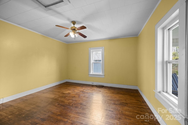 67 Montana Ave, Asheville, NC 28806 - unfurnished room with crown molding, baseboards, ceiling fan, and dark wood-style floors