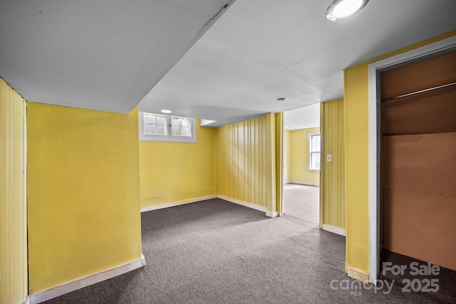 67 Montana Ave, Asheville, NC 28806 - basement featuring baseboards, a wealth of natural light, and carpet floors