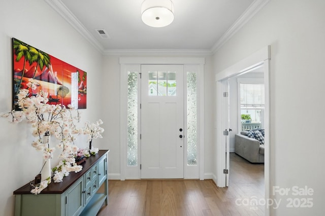 4120 Spring Cove Way, Belmont, NC 28012 - entryway with baseboards, crown molding, and light wood-style floors
