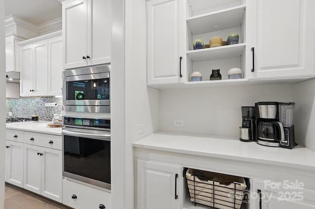4120 Spring Cove Way, Belmont, NC 28012 - kitchen featuring tasteful backsplash, open shelves, light countertops, white cabinets, and appliances with stainless steel finishes