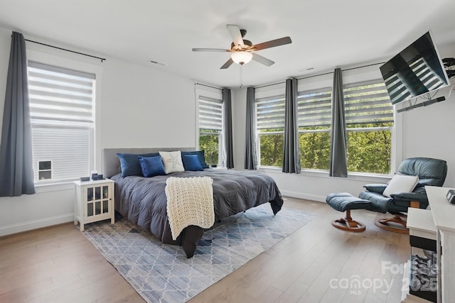 4120 Spring Cove Way, Belmont, NC 28012 - bedroom with visible vents, baseboards, a ceiling fan, and wood finished floors