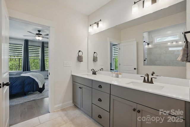 4120 Spring Cove Way, Belmont, NC 28012 - full bathroom featuring double vanity, a ceiling fan, baseboards, and a sink