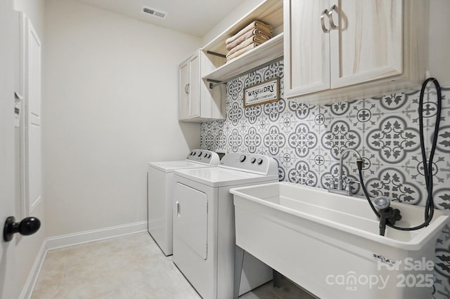4120 Spring Cove Way, Belmont, NC 28012 - laundry room featuring visible vents, baseboards, independent washer and dryer, and a sink