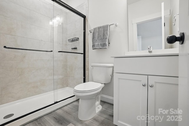 4120 Spring Cove Way, Belmont, NC 28012 - full bath featuring wood finished floors, toilet, vanity, baseboards, and a stall shower