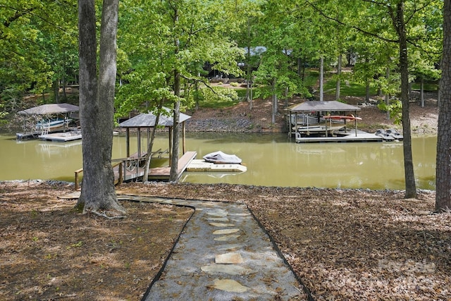 4120 Spring Cove Way, Belmont, NC 28012 - view of dock with boat lift and a water view