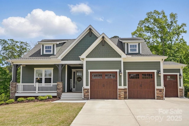 4120 Spring Cove Way, Belmont, NC 28012 - craftsman-style house featuring driveway, a front yard, covered porch, and a garage