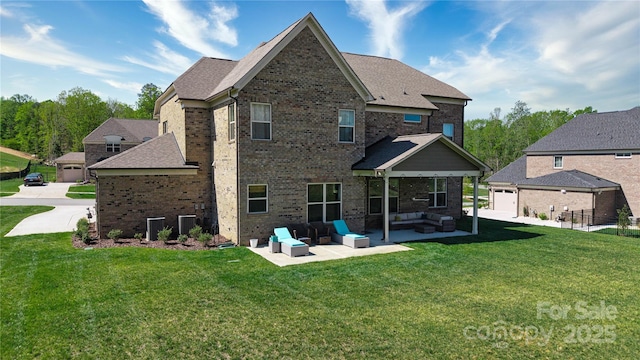 8313 Balcony Bridge Rd, Huntersville, NC 28078 - rear view of property with an outdoor hangout area, brick siding, a patio, and a yard