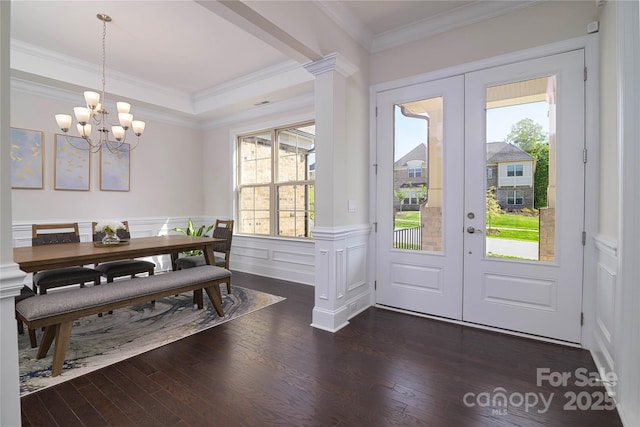 8313 Balcony Bridge Rd, Huntersville, NC 28078 - entrance foyer featuring french doors, a chandelier, dark wood-type flooring, a wainscoted wall, and ornamental molding
