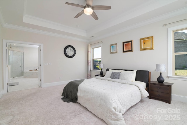 8313 Balcony Bridge Rd, Huntersville, NC 28078 - carpeted bedroom with a tray ceiling, ornamental molding, connected bathroom, baseboards, and ceiling fan