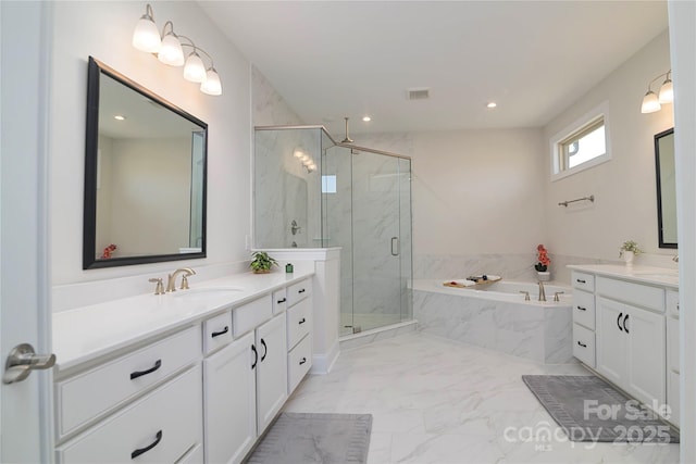 8313 Balcony Bridge Rd, Huntersville, NC 28078 - bathroom featuring marble look tiles, a marble finish shower, two vanities, a garden tub, and recessed lighting