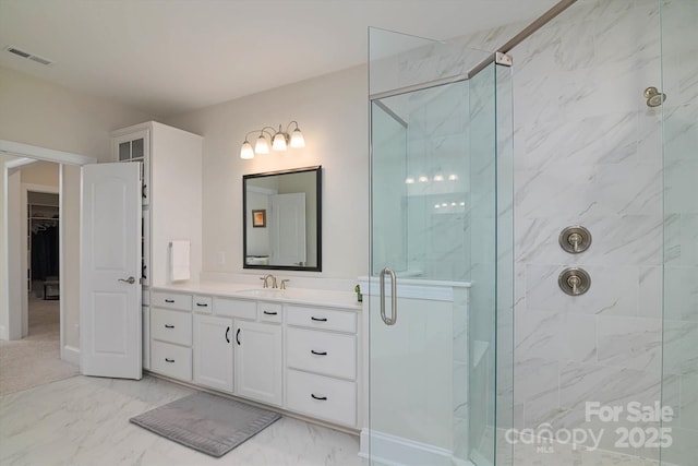 8313 Balcony Bridge Rd, Huntersville, NC 28078 - full bath with a shower stall, vanity, marble finish flooring, and a walk in closet
