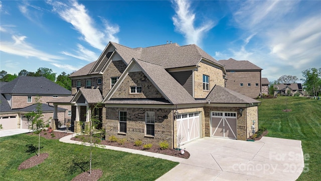 8313 Balcony Bridge Rd, Huntersville, NC 28078 - craftsman-style house with concrete driveway, a front lawn, an attached garage, a shingled roof, and brick siding