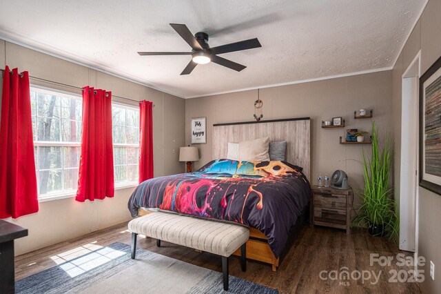 980 Lakeland Ave, Lincolnton, NC 28092 - bedroom with a ceiling fan, a textured ceiling, crown molding, and wood finished floors
