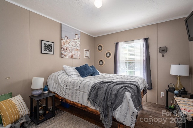 980 Lakeland Ave, Lincolnton, NC 28092 - bedroom with a textured ceiling and wood finished floors