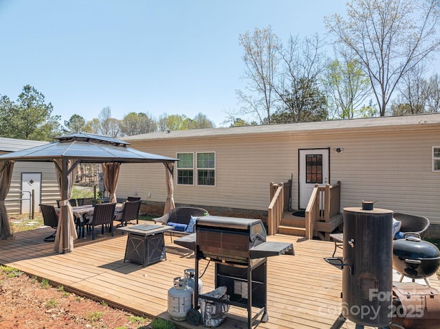 980 Lakeland Ave, Lincolnton, NC 28092 - deck featuring an outdoor fire pit, a gazebo, and outdoor dining space