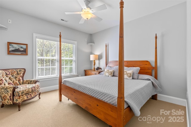 bedroom featuring carpet flooring, baseboards, and visible vents