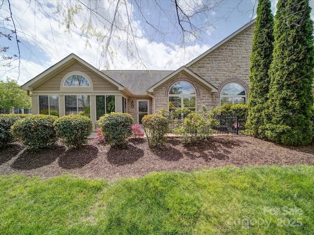 4754 Polo Gate Blvd, Charlotte, NC 28216 - view of front of property with stone siding and a front yard