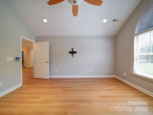 4754 Polo Gate Blvd, Charlotte, NC 28216 - spare room with ceiling fan, visible vents, vaulted ceiling, and light wood-style floors