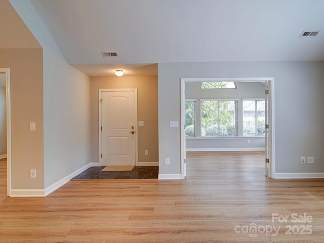 4754 Polo Gate Blvd, Charlotte, NC 28216 - entryway featuring baseboards, visible vents, and wood finished floors