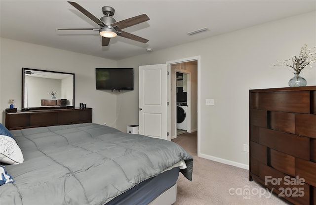 15035 Ockeechobee Ct, Mint Hill, NC 28227 - carpeted bedroom with visible vents, ceiling fan, washer / dryer, and baseboards