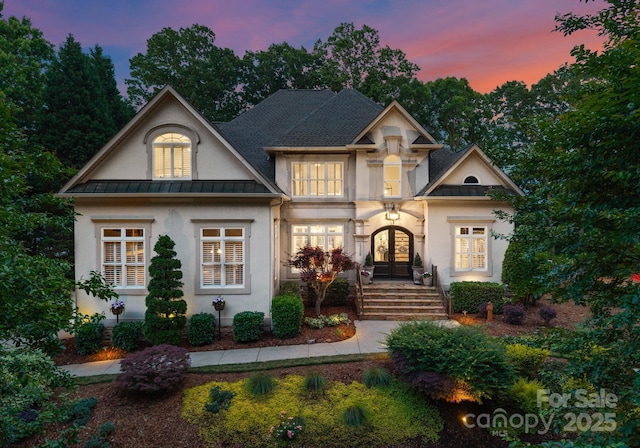 1328 Astoria Pkwy, Sherrills Ford, NC 28609 - view of front of house featuring french doors, a standing seam roof, stucco siding, and metal roof