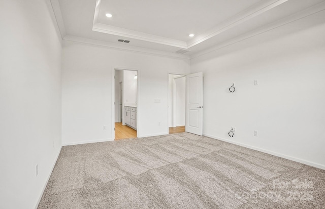 13756 Roderick Dr Unit 176, Huntersville, NC 28078 - unfurnished bedroom with visible vents, baseboards, a raised ceiling, crown molding, and light carpet