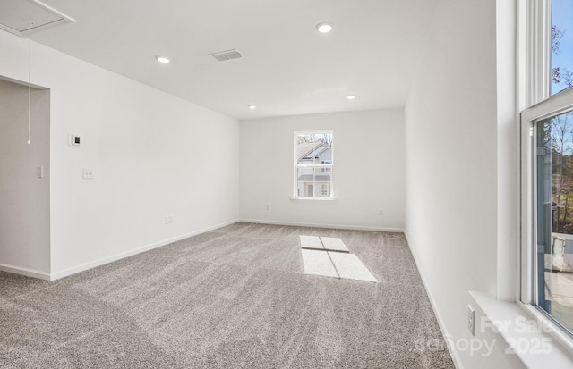 13756 Roderick Dr Unit 176, Huntersville, NC 28078 - spare room featuring visible vents, baseboards, recessed lighting, attic access, and light colored carpet