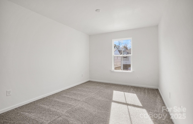 13756 Roderick Dr Unit 176, Huntersville, NC 28078 - spare room featuring carpet floors and baseboards
