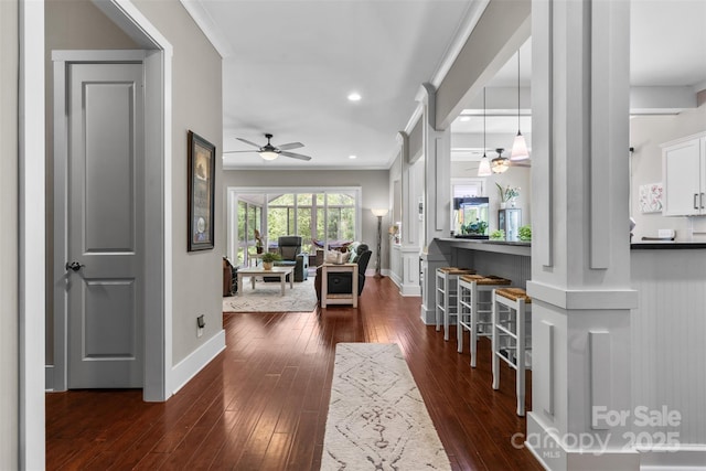 entryway featuring dark wood-type flooring, recessed lighting, baseboards, and ceiling fan