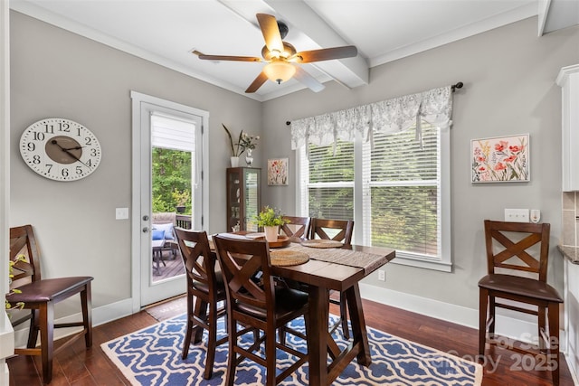dining space with baseboards, ceiling fan, crown molding, and wood finished floors