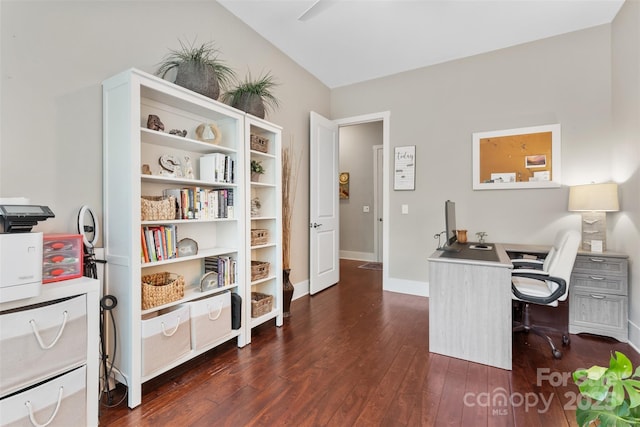 home office featuring baseboards and dark wood finished floors