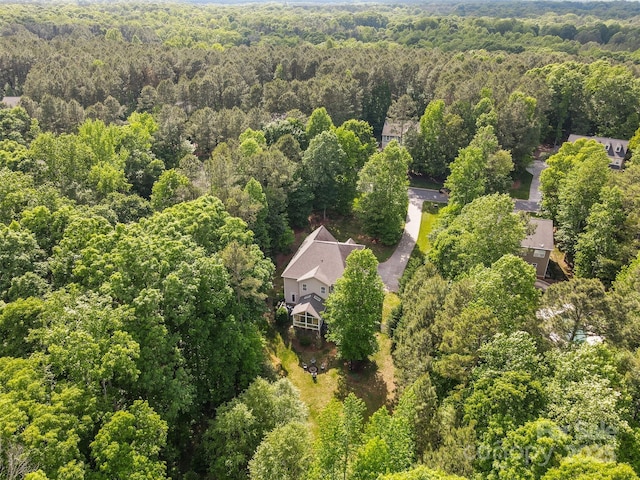 bird's eye view featuring a view of trees