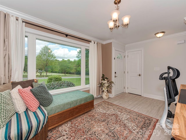 7048 Delta Lake Dr, Charlotte, NC 28215 - bedroom featuring ornamental molding, a notable chandelier, baseboards, and wood finished floors